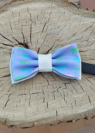 Бабочка с динозаврами сиреневая