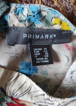 Подовжена блузка з квітами primark3 фото