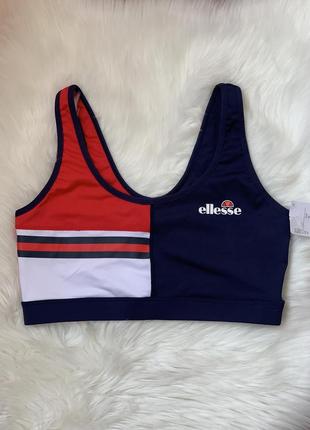 Новий спортивний топ від бренду ellesse