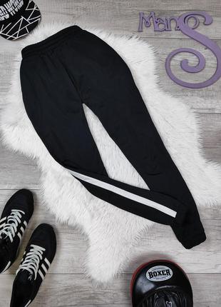 Жіночі спортивні штани crane чорні з білими смужками з боків розмір 42 xs