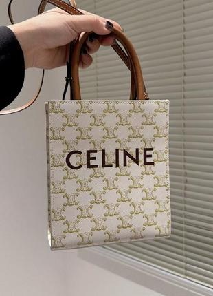 Бежева сумка в стилі celine з коричневим ремінцем