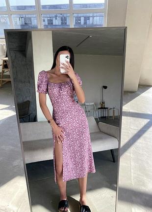 Ніжна квіткова сукня міді, розріз по ніжці, відкрита спинка, на талії зав'язки.  пошита з натурального штапеля.🩷💙