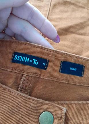 Юбка джинсовая на заклепках3 фото