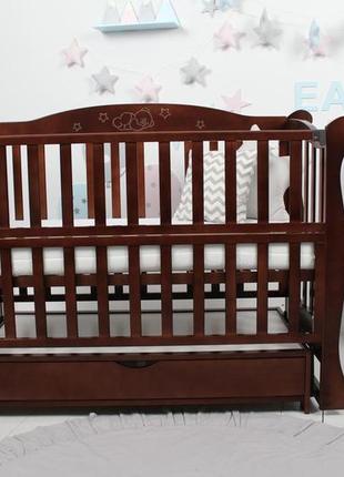 Кровать детская baby comfort лд10 орех с ящиком и резьбой2 фото