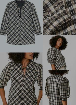Блуза в клетку с пышным рукавом