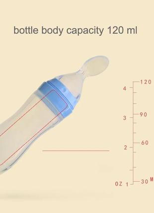 Силіконовий контейнер з ложкою для першого прикорму блакитний5 фото