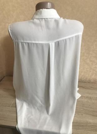 Воздушная белоснежная блуза без рукавов3 фото