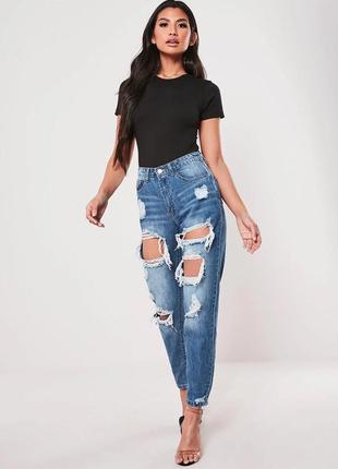 Стильные женские джинсы с вырезами4 фото