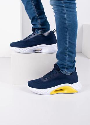 Чоловічі сині кросівки з текстилю4 фото