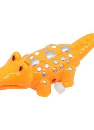 Заводна іграшка "крокодил", жовтогарячий