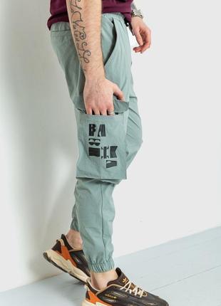 Спортивні брюки чоловічі тонкі стрейчеві колір світло-оливковий3 фото