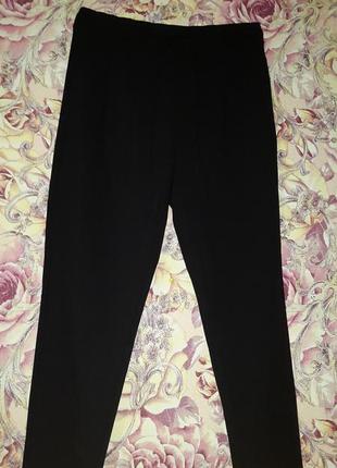 Черные классические брюки с завязкой на поясе1 фото