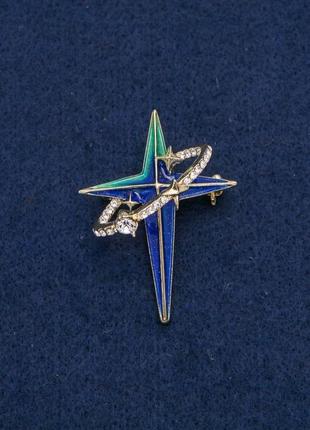 Брошка-кулон зірка в овальному кільці золотистий метал із білими стразами та в синій, бірюзовій емалі 45х33мм +-