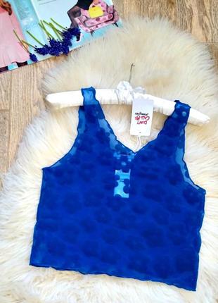 Топ в сітку і квіти