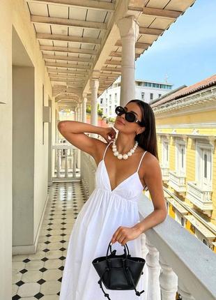 Сукня довга біла з вирізом на грудях та спинці легка літня на літо