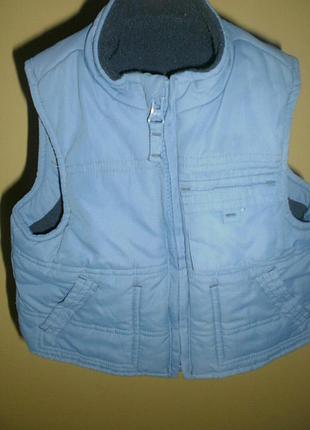 Шикарна тепленька зручна безрукавочка mothercare