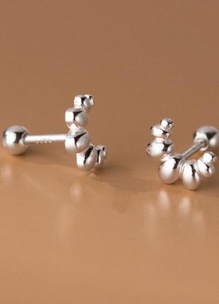 Серебряные серьги закрутки в минималистическом дизайне6 фото