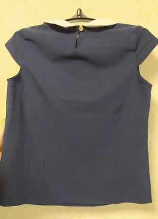 Блузка синего цвета с белым воротником2 фото