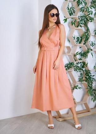 Розовое платье с декольте на запах1 фото