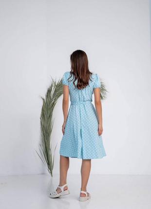 Сукня жіноча міді із запахом блакитна з короткими рукавами2 фото