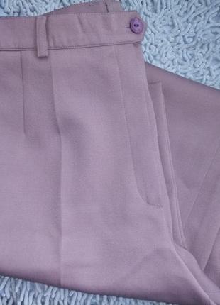 Новые светло -сиреневые брюки