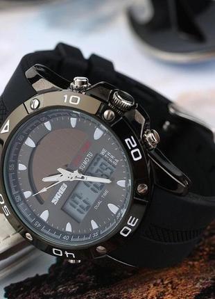 Спортивний чоловічий годинник skmei 1064 solar чорний наручний з сонячною батареєю9 фото