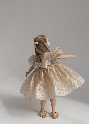 Роскошное праздничное блестящее платье для девочки на торжественное событие с бантом