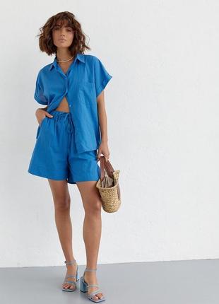 Жіночий літній костюм шорти та сорочка синій1 фото