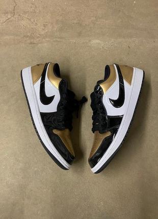 Nike air jordan 1 low gold toe кроссовки1 фото