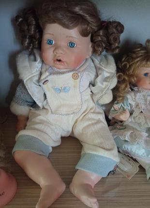 Продам коллекцию фарфоровых кукол5 фото