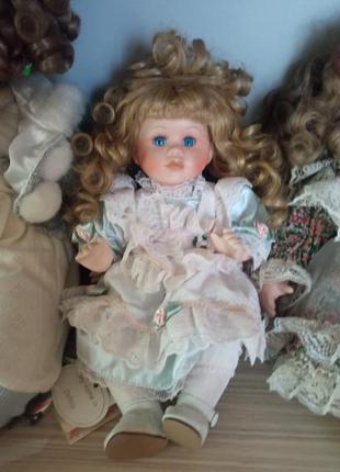 Продам коллекцию фарфоровых кукол3 фото