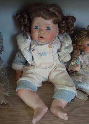 Продам коллекцию фарфоровых кукол2 фото