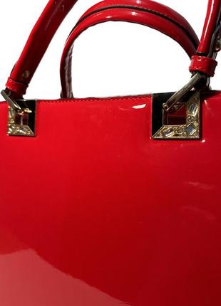 Жіноча сумка з лакованої еко шкіри червоного кольору2 фото
