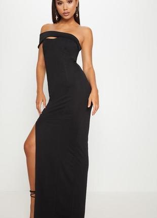 Черное вечернее платье макси с высоким разрезом на ноге1 фото