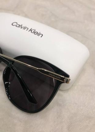 Сірі овальні сонцезахисні окуляри унісекс calvin klein5 фото