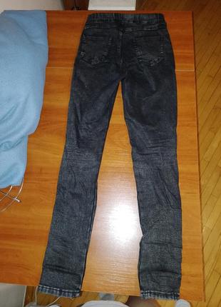 Черные джинсы 25 г.1 фото