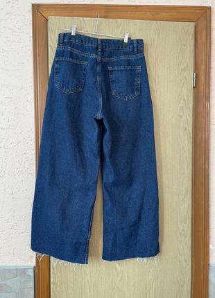 Плотные джинсы с необработанными штанишками2 фото