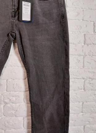 Фирменные стрейчевые джинсы скинни 32р.2 фото