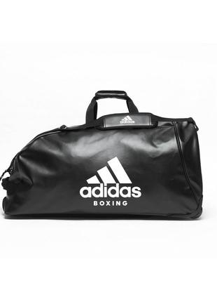 Спортивная дорожная сумка на колесах adidas boxing с выдвижной ручкой обьем 120 литров из pu-кожи4 фото