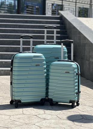Качественный чемодан по низкой цене,пластик,4 колеса,дорожная сумка,кодовый замок, чемодан, удобная кладь,средний, большой1 фото