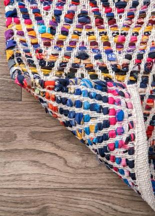 Яскравий безворсовий килим ручного ткацтва з геометричним візерунком