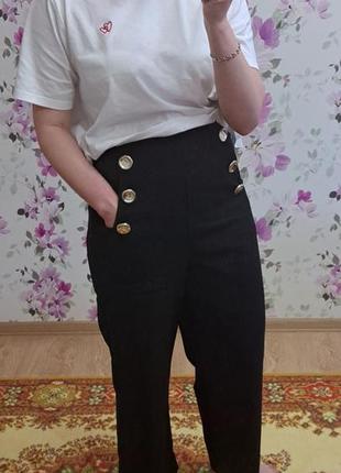 Штаны с декоративными пуговицами