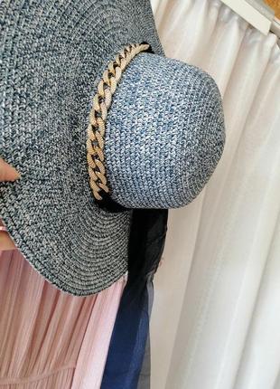 Пляжний плетений капелюх з прикрасою2 фото