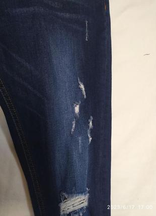 99% котон. жіночі рвані стрейчеві джинси  з потертостями...8 фото