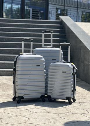Средний чемодан,на 70 л, качественный чемодан по низкой цене,пластик,4 колеса,дорожная сумка,чемодан,ручная поклажа, большой1 фото