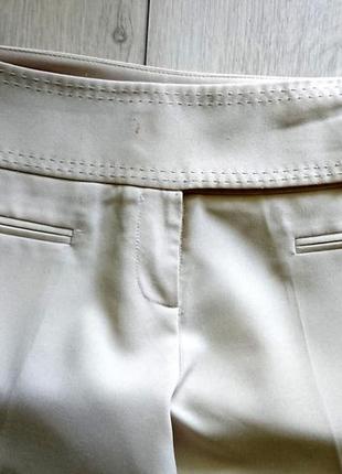 Бежеві широкі брюки2 фото