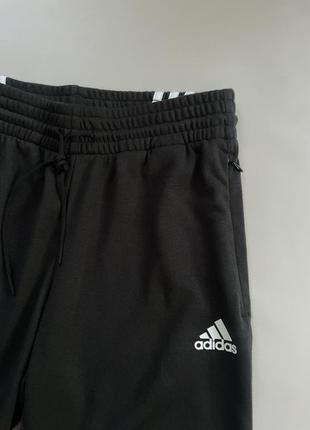 Спортивні штани жіночі adidas performance h670303 фото