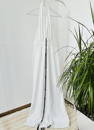 Белый комбинезон с открытой спинкой брюками палаццо из костюмной ткани5 фото