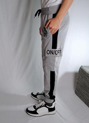 Спортивні чоловічі штани молодіжні світло сірі з боковими кишенями4 фото