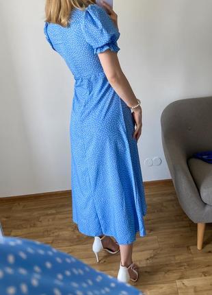 Блакитна сукня асиметричного крою в горошок9 фото